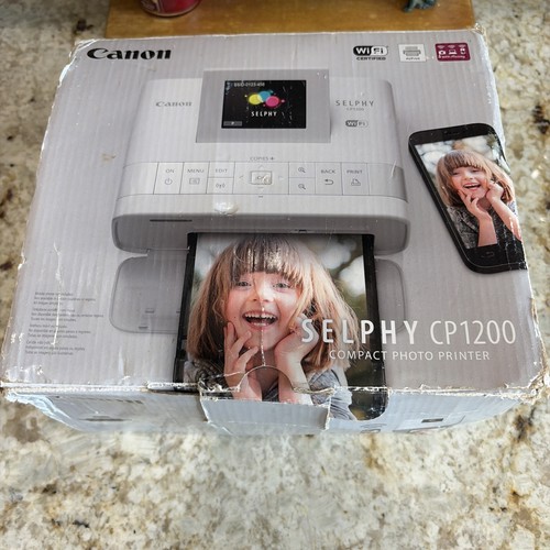 Canon selphy cp1200 - canon,